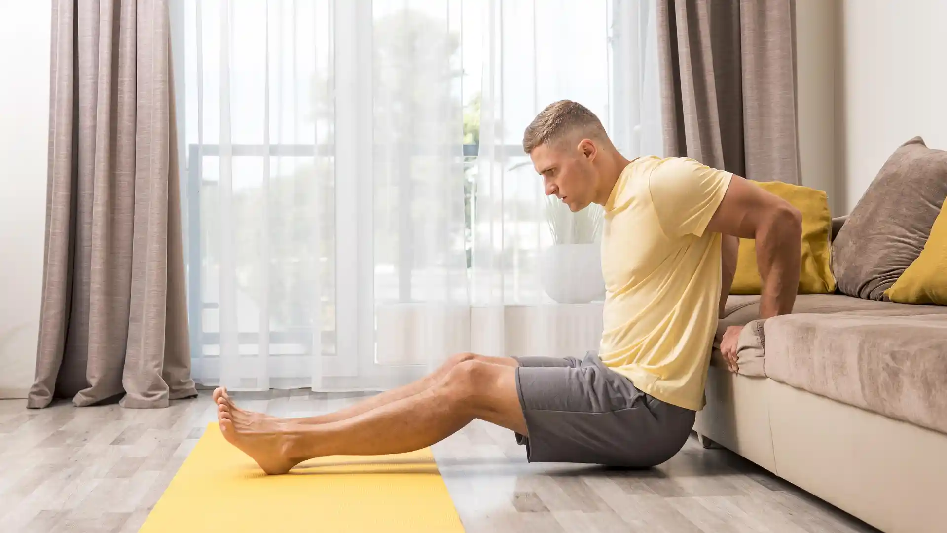 man-exercising-home-using-co shoulder exercises